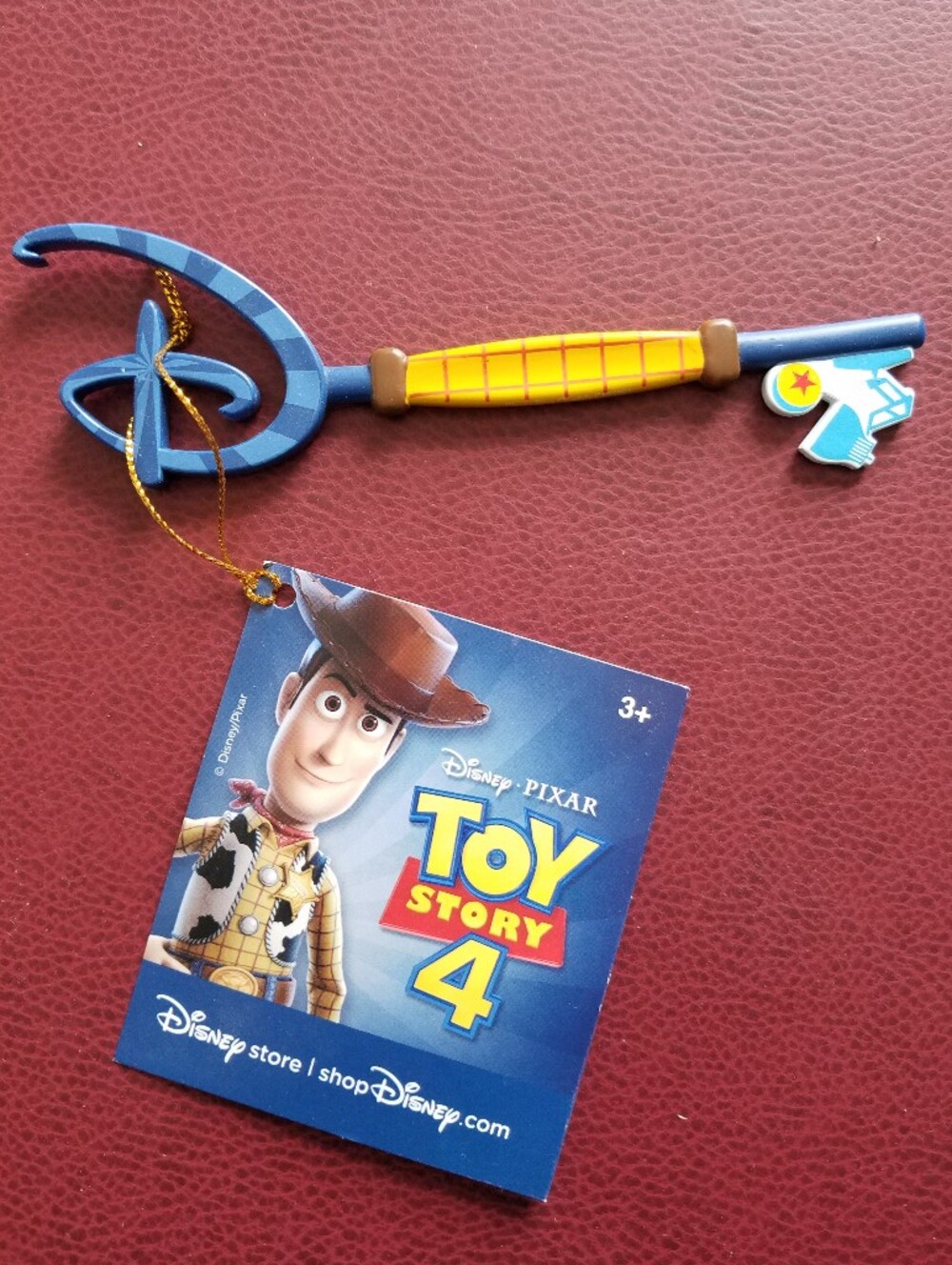 Disney Store Pixar Toy Story 4 Blue/Yellow Collectible Key Woody